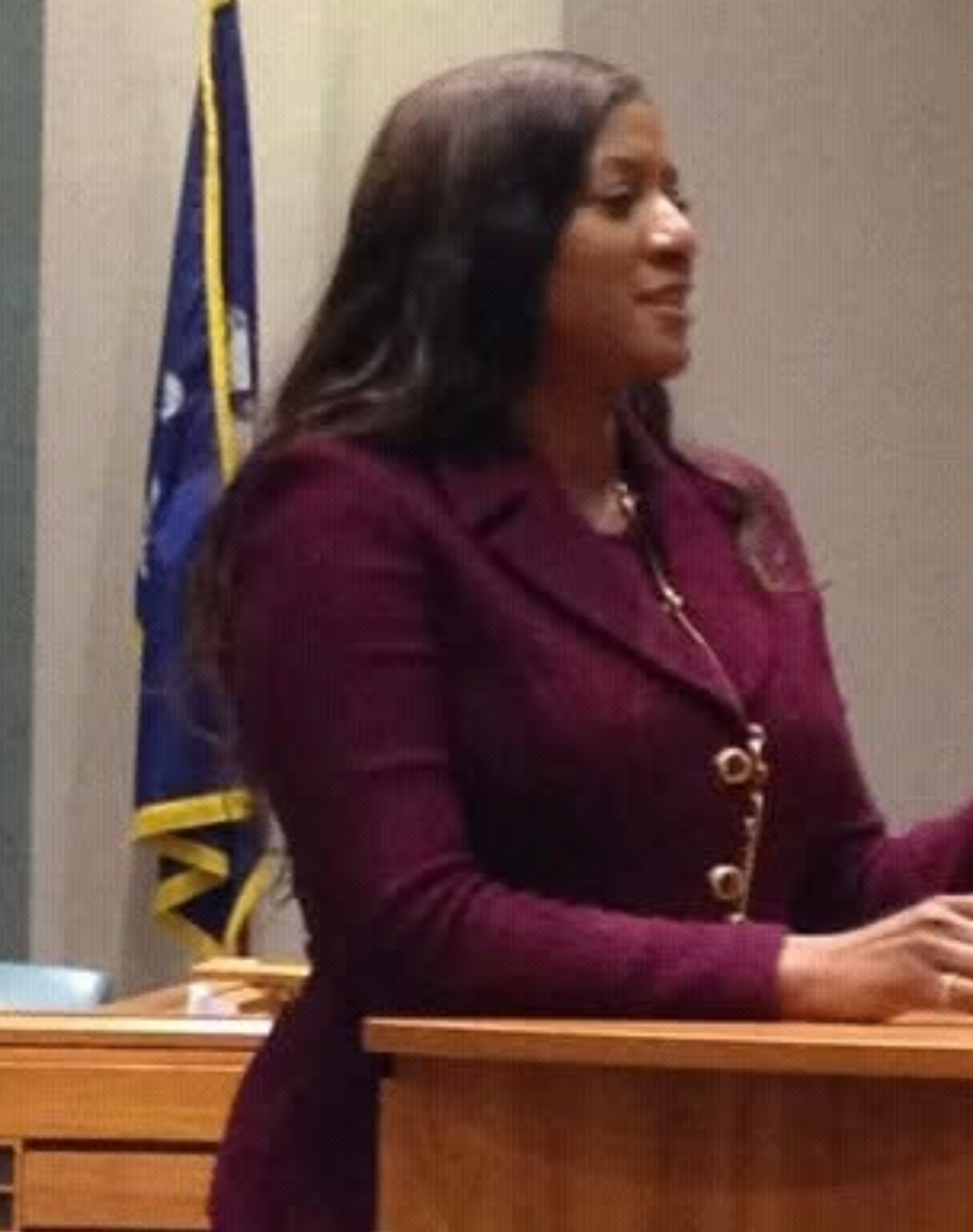 Judge Sheva Sims speaking from the bench in the courtroom